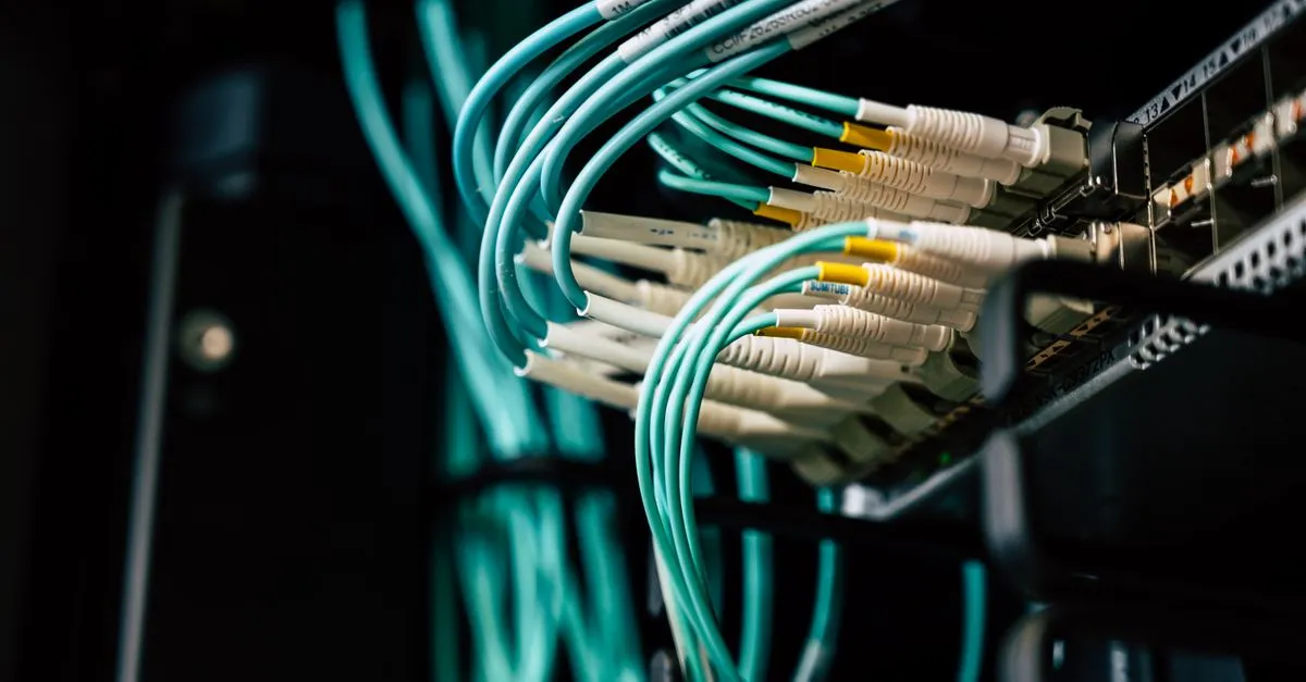 Network switch with patch cables in a server rack, used for IP subnet planning