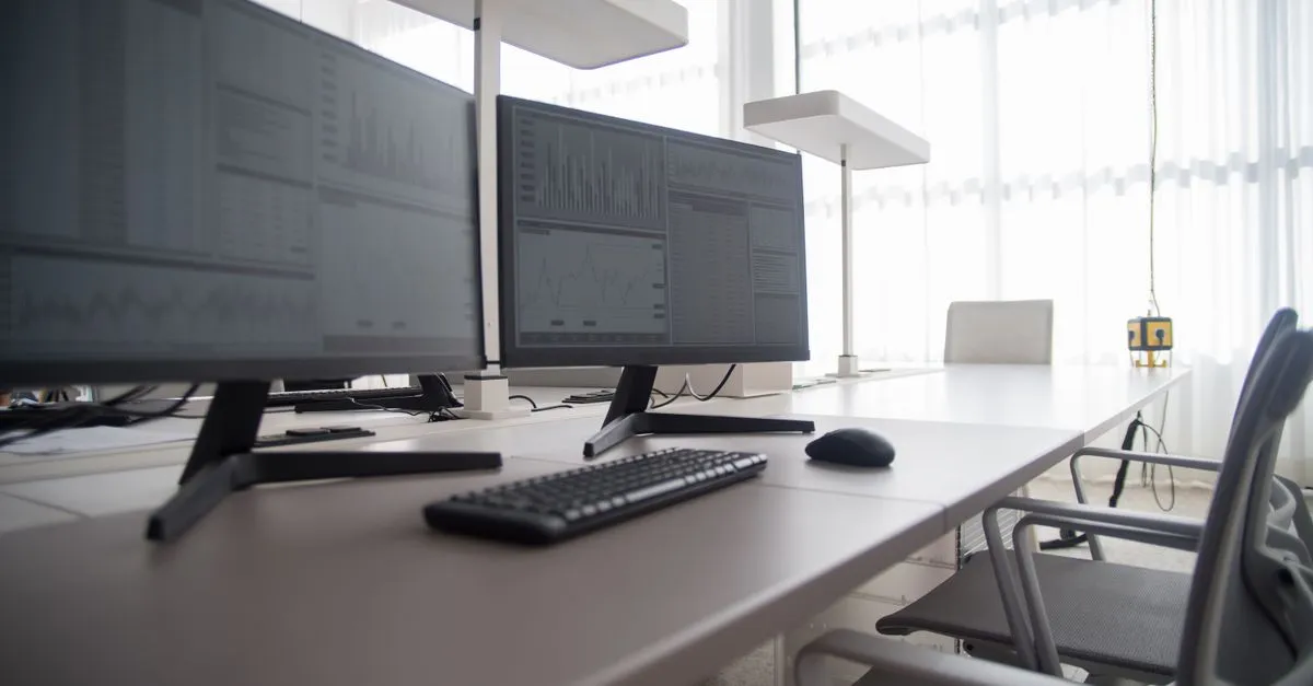 Computer monitor on a desk — checking screen resolution and display size